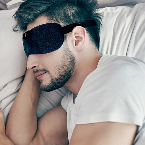 SleepMagic - Smart Anti-Snoring Eye Mask + Sleep Data, SleepMagic eye mask used by a sleeping man